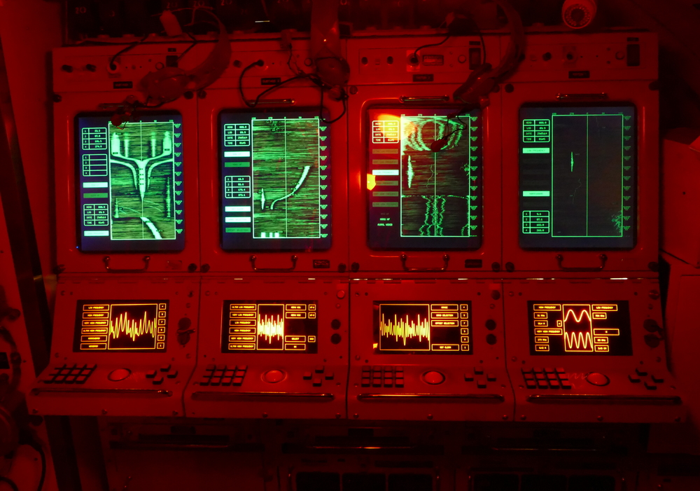 red lighting and big green CRT displays