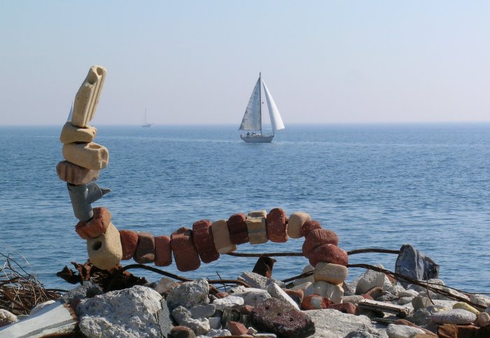 Rebar, driftbrick, and a sailboat
